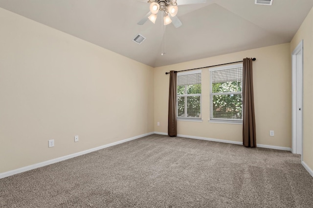 13228 Miller Ln, Willis, TX 77318 - unfurnished room featuring vaulted ceiling, carpet flooring, ceiling fan, and baseboards