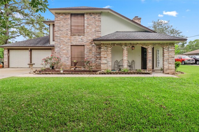 prairie-style home featuring concrete driveway, a front yard, a garage, a shingled roof, and a chimney