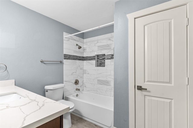 full bathroom with toilet, vanity, wood finished floors, and tub / shower combination