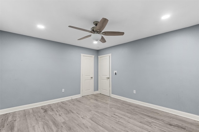 unfurnished room with ceiling fan, wood finished floors, baseboards, and recessed lighting