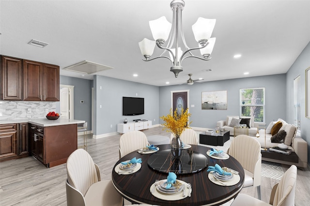3853 Rosedale St, Houston, TX 77004 - dining area featuring attic access, light wood-type flooring, recessed lighting, and a chandelier