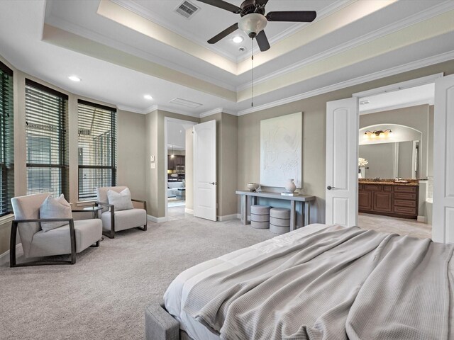 20722 Lavone Dr, Porter, TX 77365 - bedroom with crown molding, a raised ceiling, light colored carpet, baseboards, and ensuite bath
