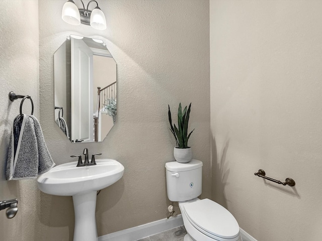 20722 Lavone Dr, Porter, TX 77365 - bathroom featuring toilet and baseboards