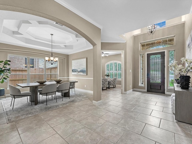 20722 Lavone Dr, Porter, TX 77365 - foyer with a chandelier, ornamental molding, baseboards, arched walkways, and a ceiling fan