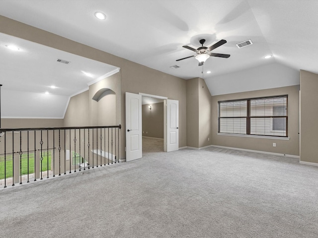 20722 Lavone Dr, Porter, TX 77365 - empty room with vaulted ceiling, a ceiling fan, carpet floors, recessed lighting, and plenty of natural light
