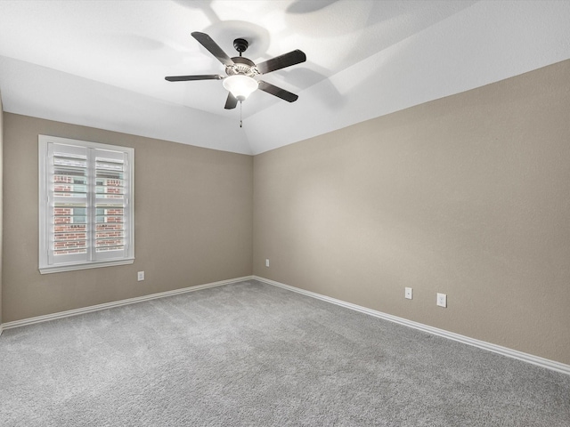 20722 Lavone Dr, Porter, TX 77365 - empty room featuring carpet floors, a ceiling fan, baseboards, and lofted ceiling