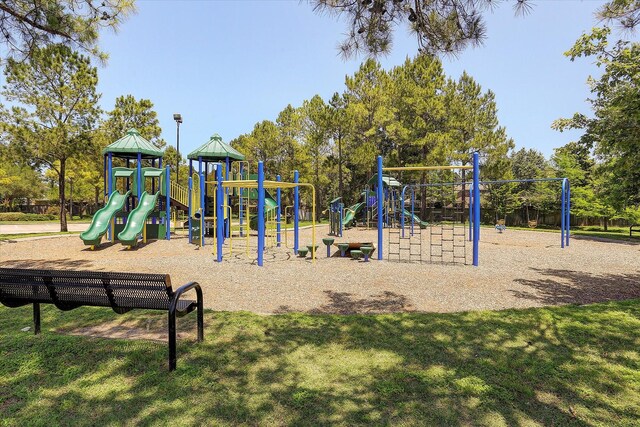 community play area featuring a yard