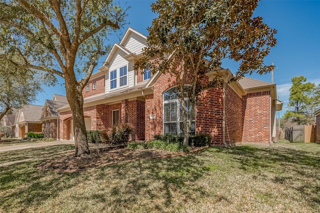 19010 Grove Valley Trl, Houston, TX 77084 - traditional home with brick siding, driveway, and a garage