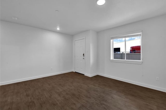 12603 Telge Rd Unit 11E-F, Cypress, TX 77429 - spare room featuring dark wood-style floors, recessed lighting, and a smoke detector