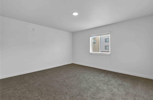 12603 Telge Rd Unit 11E-F, Cypress, TX 77429 - spare room featuring dark carpet and recessed lighting