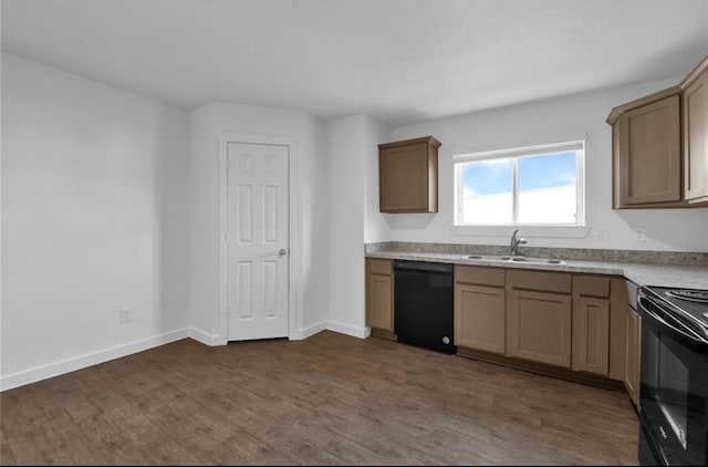 12603 Telge Rd Unit 11E-F, Cypress, TX 77429 - kitchen featuring black appliances, dark wood finished floors, and light countertops