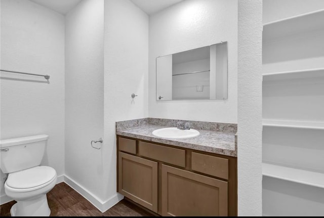 12603 Telge Rd Unit 11E-F, Cypress, TX 77429 - bathroom with wood finished floors and vanity