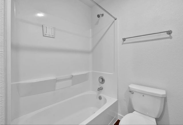 12603 Telge Rd Unit 11E-F, Cypress, TX 77429 - bathroom featuring shower / tub combination and a textured wall