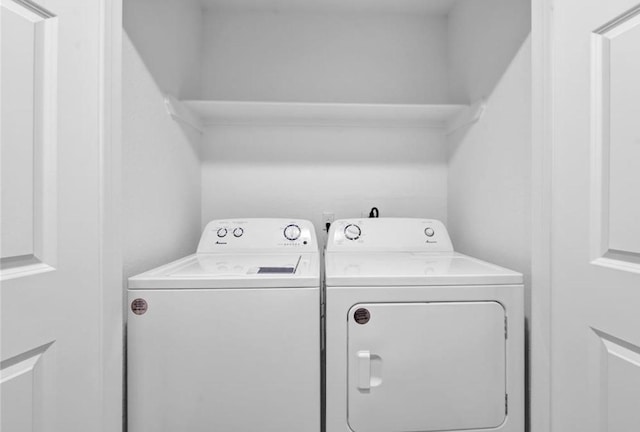 12603 Telge Rd Unit 11E-F, Cypress, TX 77429 - laundry area featuring washer and dryer