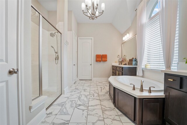 full bath featuring marble finish flooring, a stall shower, a chandelier, a garden tub, and vaulted ceiling