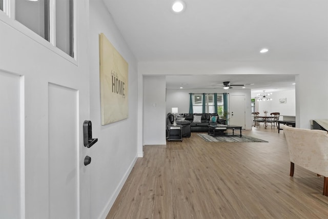 5927 Warm Springs Rd, Houston, TX 77035 - living room featuring light wood finished floors, recessed lighting, baseboards, and a ceiling fan