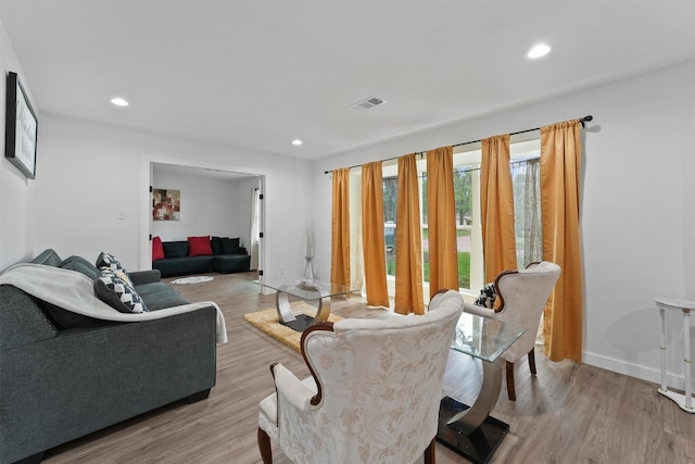 5927 Warm Springs Rd, Houston, TX 77035 - living room featuring wood finished floors, recessed lighting, and baseboards