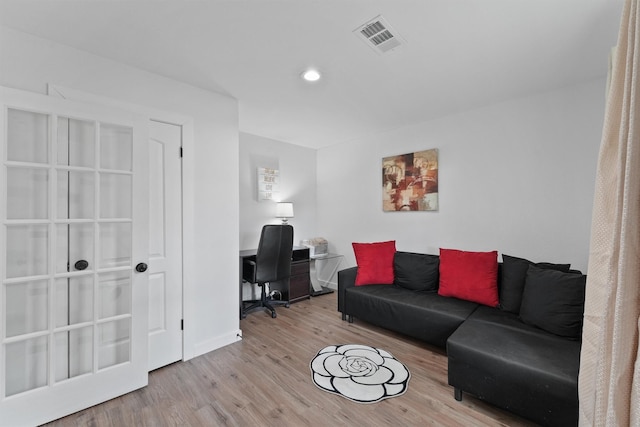 5927 Warm Springs Rd, Houston, TX 77035 - living area with wood finished floors, an office area, recessed lighting, and baseboards