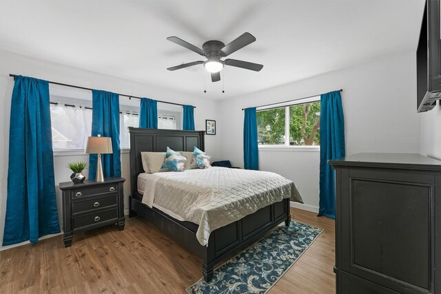 5927 Warm Springs Rd, Houston, TX 77035 - bedroom featuring wood finished floors and ceiling fan