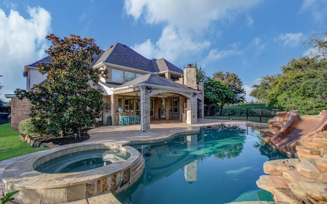 9803 White Rock Lake Trl, Cypress, TX 77433 - view of pool with a patio area and a pool with connected hot tub