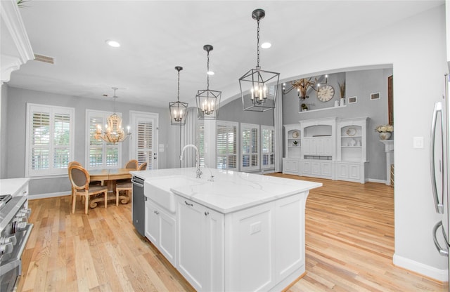 9803 White Rock Lake Trl, Cypress, TX 77433 - kitchen featuring a chandelier, stove, dishwasher, plenty of natural light, and recessed lighting