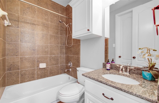 9803 White Rock Lake Trl, Cypress, TX 77433 - bathroom with vanity, toilet, and bathtub / shower combination