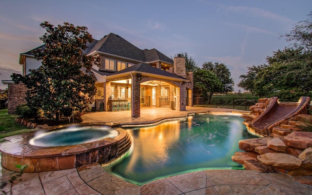 9803 White Rock Lake Trl, Cypress, TX 77433 - view of swimming pool with a patio and a pool with connected hot tub