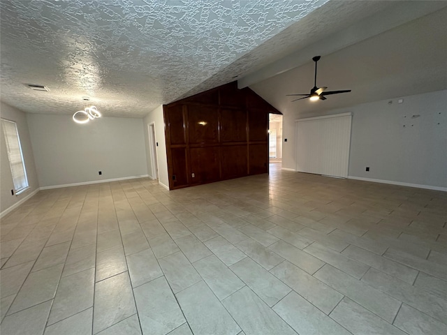 2934 Poplar Creek Ln, Pearland, TX 77584 - unfurnished living room featuring a ceiling fan, a textured ceiling, vaulted ceiling, and baseboards