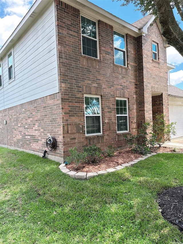 8535 Morning Oak Ln, Cypress, TX 77433 - view of property exterior featuring brick siding, a yard, and an attached garage