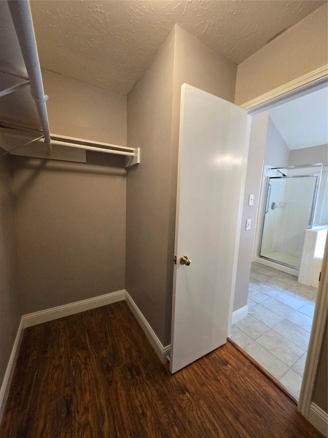 2727 N Larkspur Cir, Pearland, TX 77584 - walk in closet featuring wood finished floors
