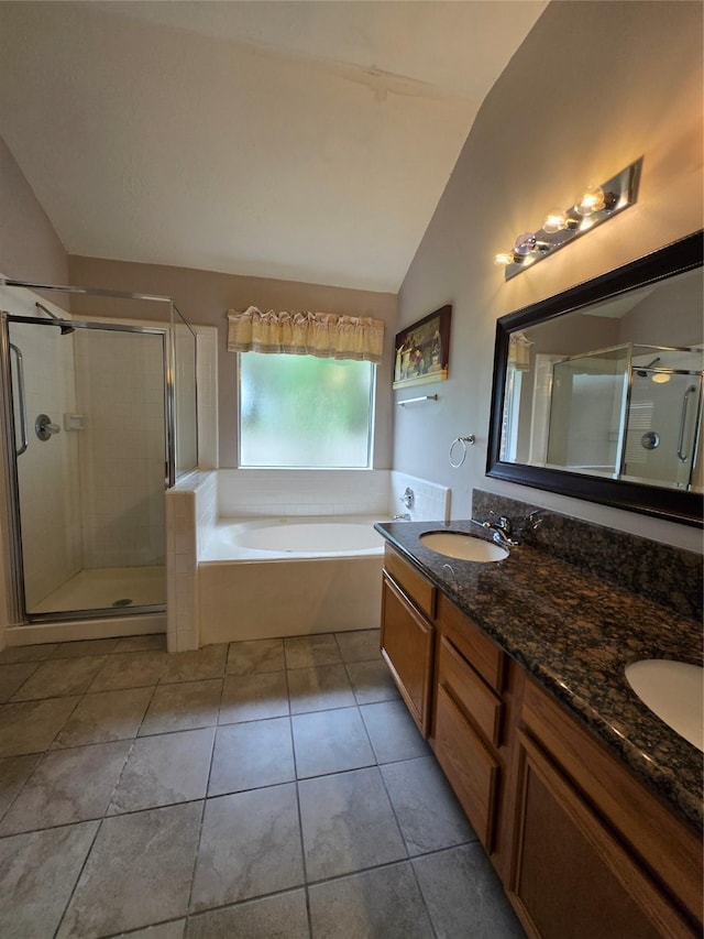 2727 N Larkspur Cir, Pearland, TX 77584 - full bath with lofted ceiling, a garden tub, a shower stall, double vanity, and tile patterned floors