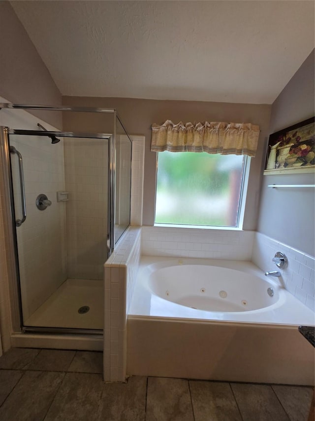 2727 N Larkspur Cir, Pearland, TX 77584 - full bath featuring tile patterned flooring, a whirlpool tub, a shower stall, and lofted ceiling