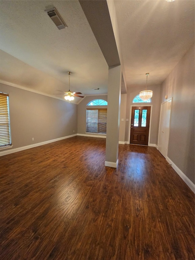 2727 N Larkspur Cir, Pearland, TX 77584 - entryway with a chandelier, dark wood-type flooring, lofted ceiling, a textured ceiling, and ceiling fan