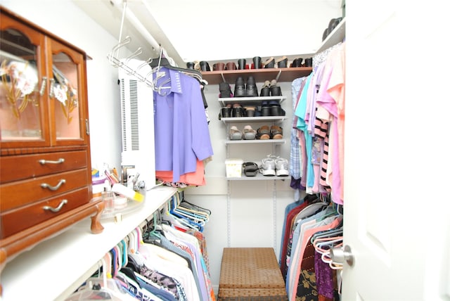walk in closet with a heating unit