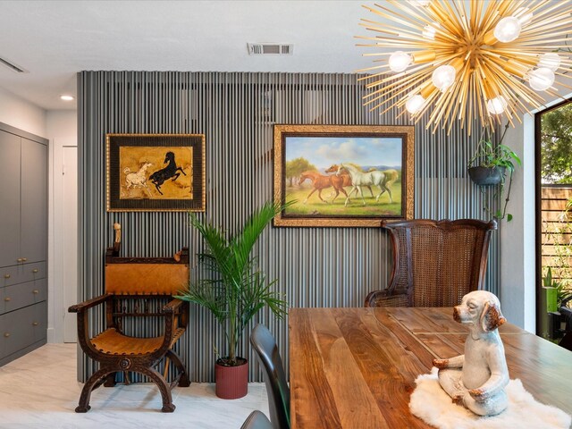 dining room featuring a chandelier