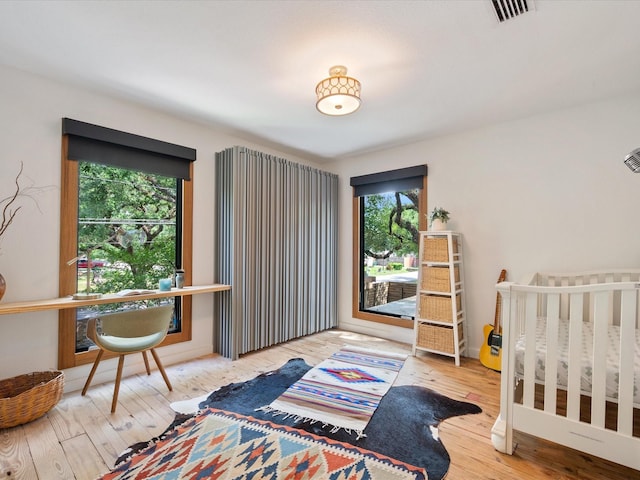 bedroom featuring wood finished floors