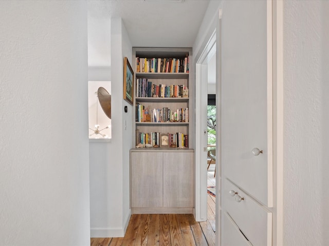 hallway featuring wood finished floors