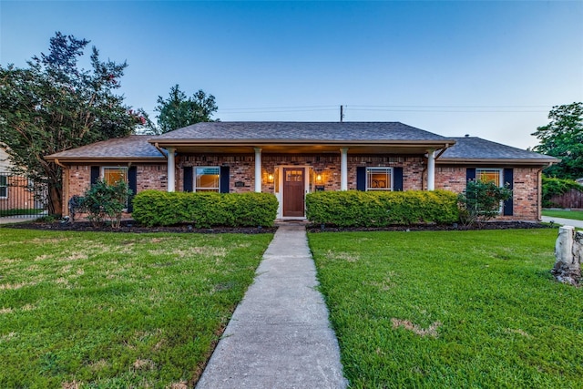 6031 Mcknight St, Houston, TX 77035 - view of front of house with brick siding and roof with shingles