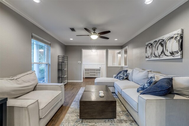 6031 Mcknight St, Houston, TX 77035 - living room with ceiling fan, wood finished floors, recessed lighting, crown molding, and baseboards