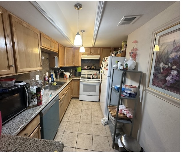 8979 Imogene St, Houston, TX 77036 - kitchen featuring white appliances, a sink, under cabinet range hood, light tile patterned floors, and backsplash