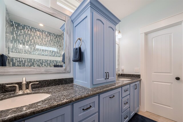 full bathroom with double vanity