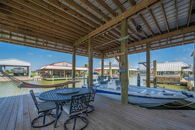 dock with a water view and boat lift