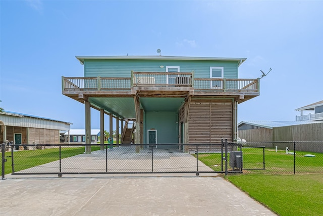 view of front of house featuring stairs, a gate, and a deck