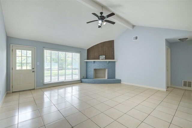 unfurnished living room featuring ceiling fan, light tile patterned floors, baseboards, and a brick fireplace