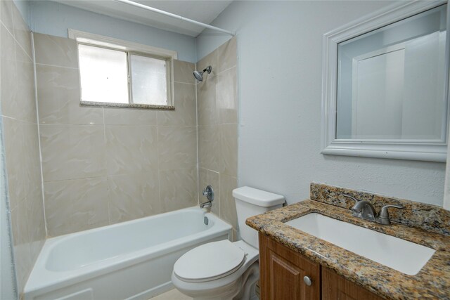 full bathroom featuring shower / bathtub combination, toilet, and vanity