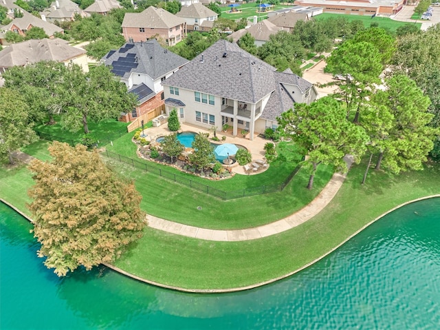 view of subject property with a nearby body of water