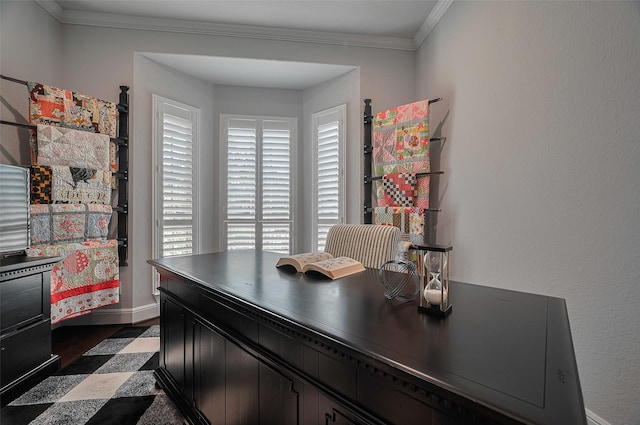 home office with ornamental molding, healthy amount of natural light, and baseboards