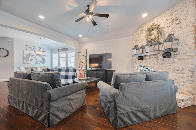 living room with crown molding, a ceiling fan, dark wood-style floors, a chandelier, and recessed lighting