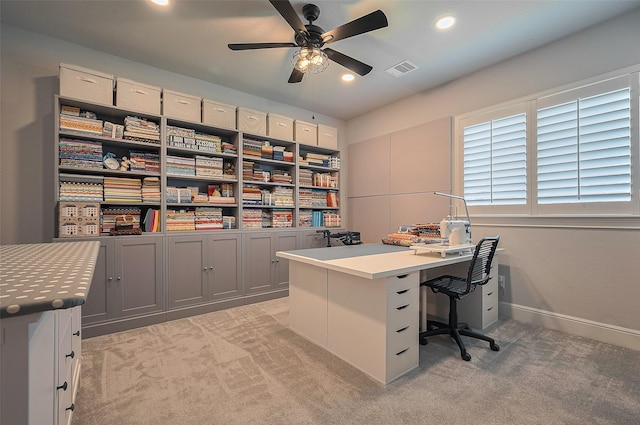 office space with light carpet, a ceiling fan, baseboards, and recessed lighting