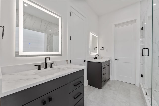 3912 Tulane St, Houston, TX 77018 - full bathroom with a marble finish shower, two vanities, and marble finish floors